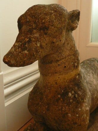 Pair of early 20th century composite stone greyhound dogs