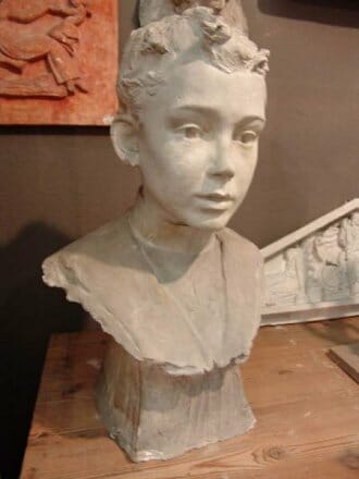 French plaster bust of a child from turn of the century