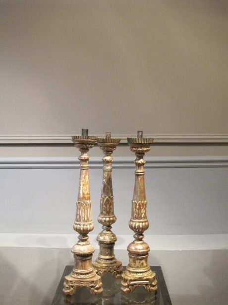 19th century italian giltwood torcheres (candlesticks) on trefoil base