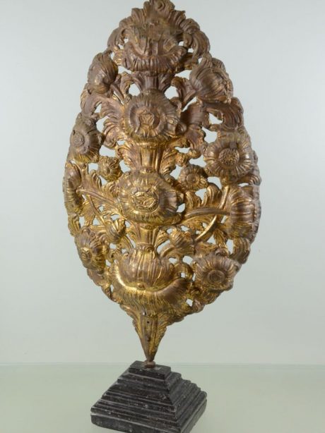 Floral pressed brass decoration mounted on a stand c.1910