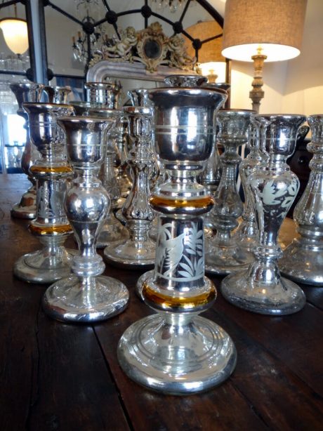 Large collection of antique mercury glass candlesticks