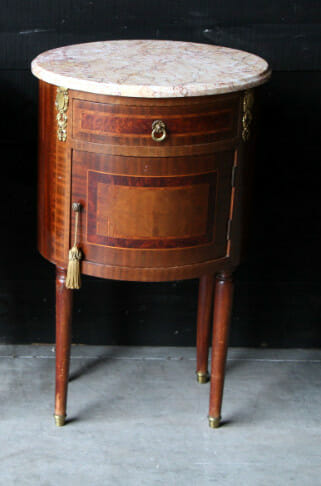 Pair of French oval LXVI mahogany nightstands c.1890