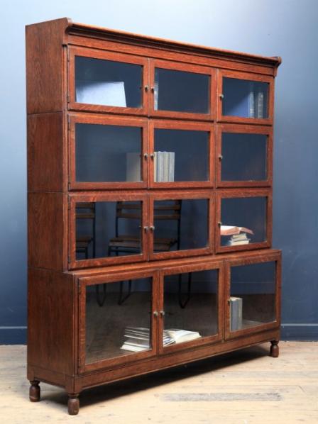 Large oak Mintys Oxford glazed stacking bookcase c.1930