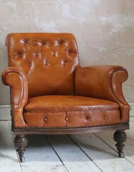 Generous pair of Edwardian leather armchairs