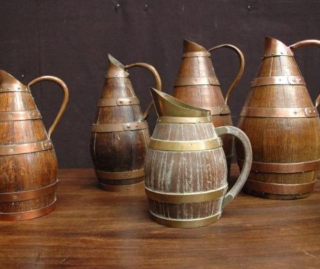 Antique handmade oak and copper wine and cider jugs