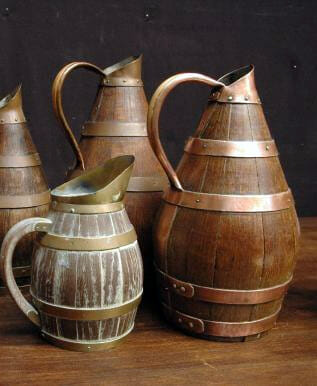Antique handmade oak and copper wine and cider jugs