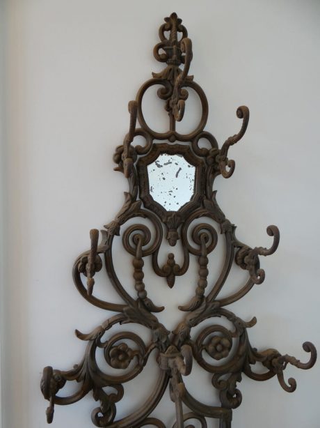 Antique cast iron coat hook and umbrella stand with original mirror  plate