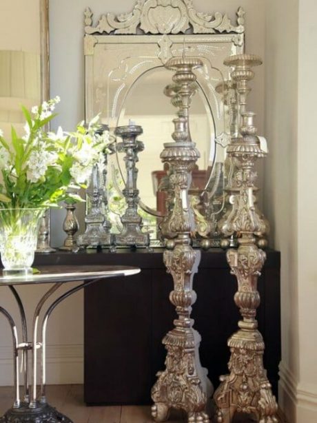 Pair of silvered wooden altar candlesticks