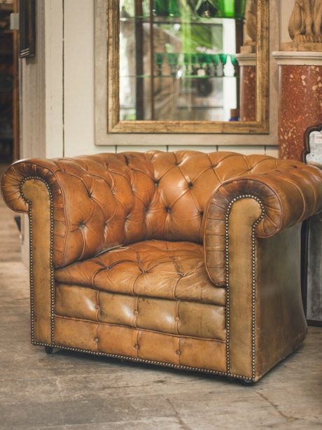 Vintage English leather button back arm chair