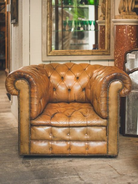 Vintage English leather button back arm chair