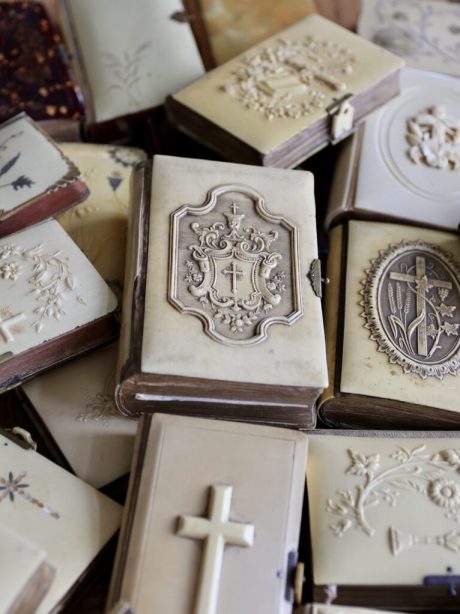 A collection of antique French celluloid missals