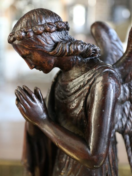 A rare pair of 17th century carved kneeling angels