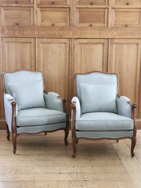 Pair of antique French oak cabriole armchairs