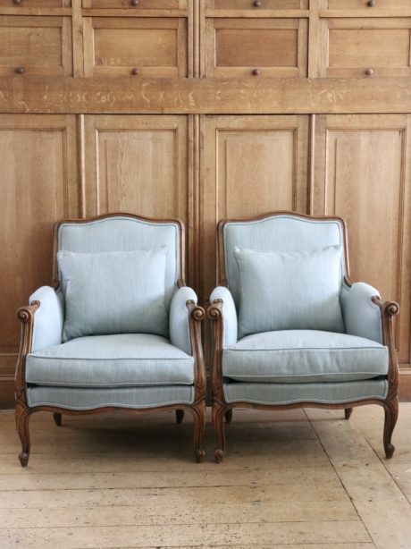 Pair of antique French oak cabriole armchairs
