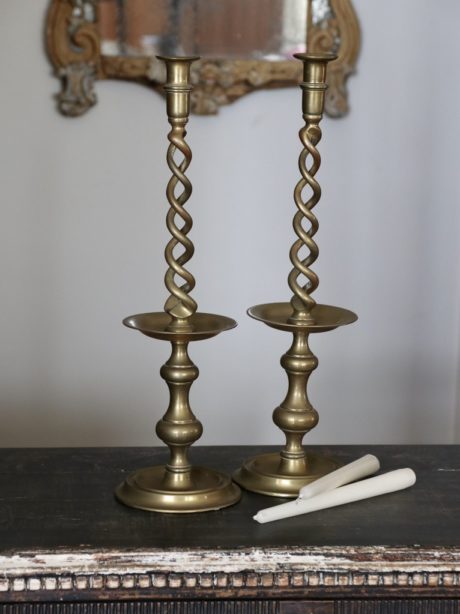 Pair of bronze twisted barrel candlesticks