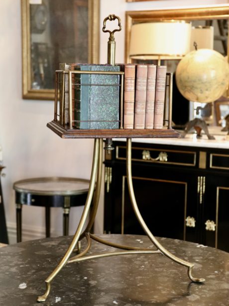 Antique brass and mahogany revolving bookcase