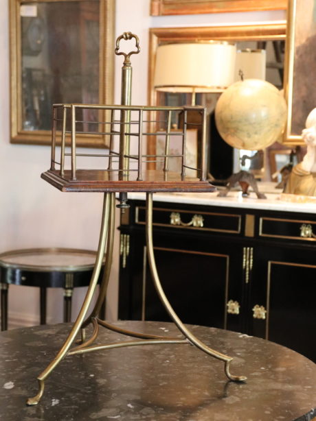 Antique brass and mahogany revolving bookcase