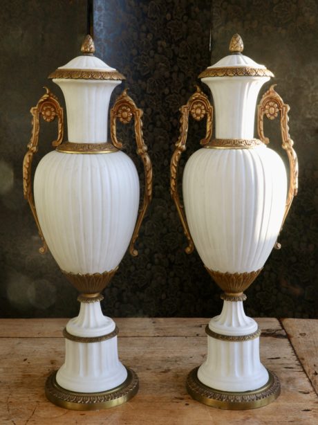 Pair of Louis XVI style lidded earthenware vases