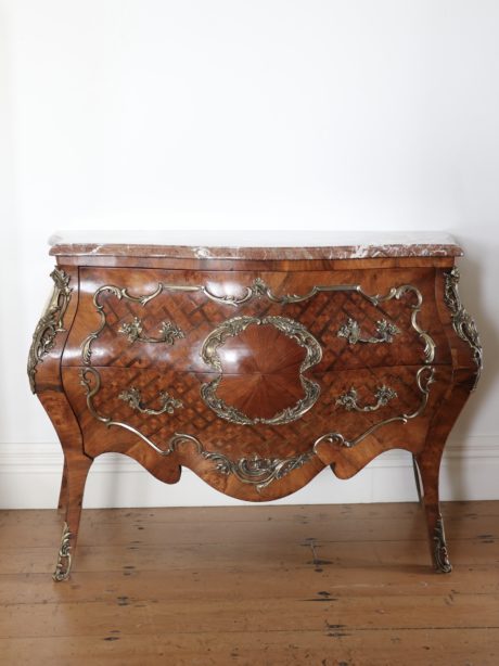 Louis XV style bombe chest in marquetry and bronze