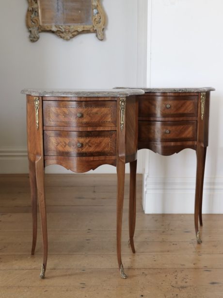 A pair of Louis XV style bedside tables