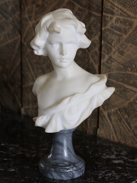 Alabaster and marble bust of a child by Aurili