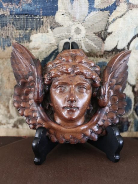 Antique walnut hand carved face of an angel