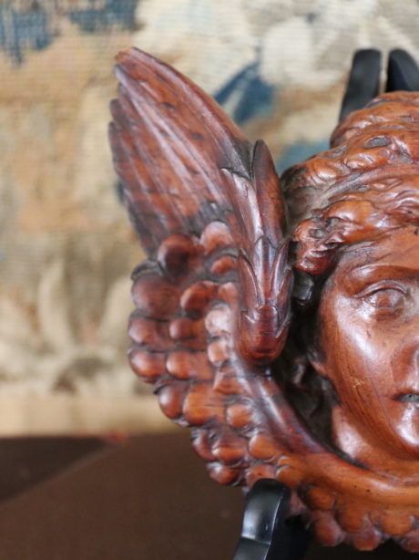 Antique walnut hand carved face of an angel