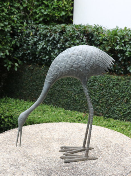 A pair of decorative bronze crane birds