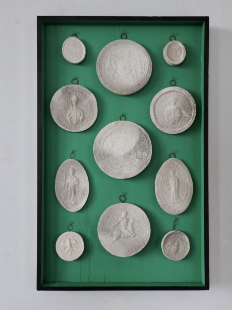 Mounted plaster intaglios and medallions