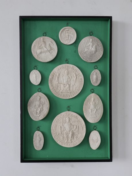 Mounted plaster intaglios and medallions