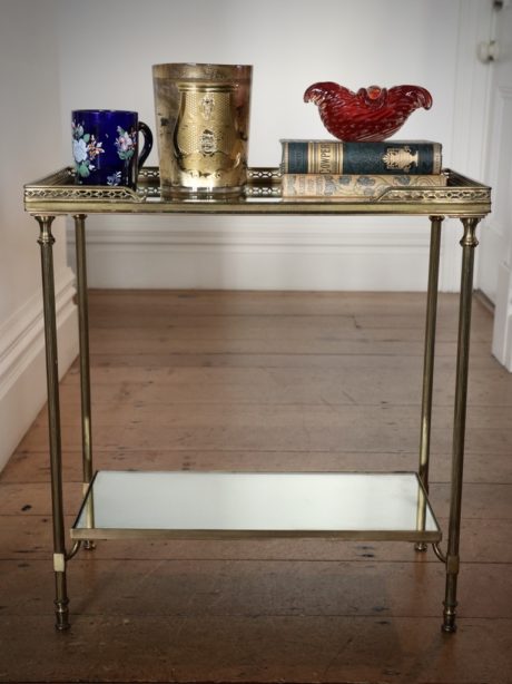A mid-century two tiered occasional table